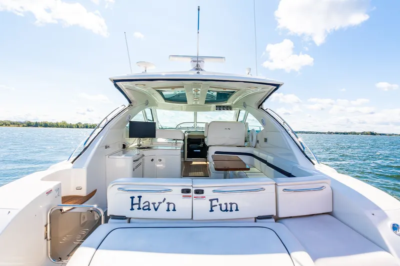 Hav-n Fun Yacht Photos Pics 2009 Sea Ray 470 Sundancer yacht on water, featuring spacious deck and seating area.