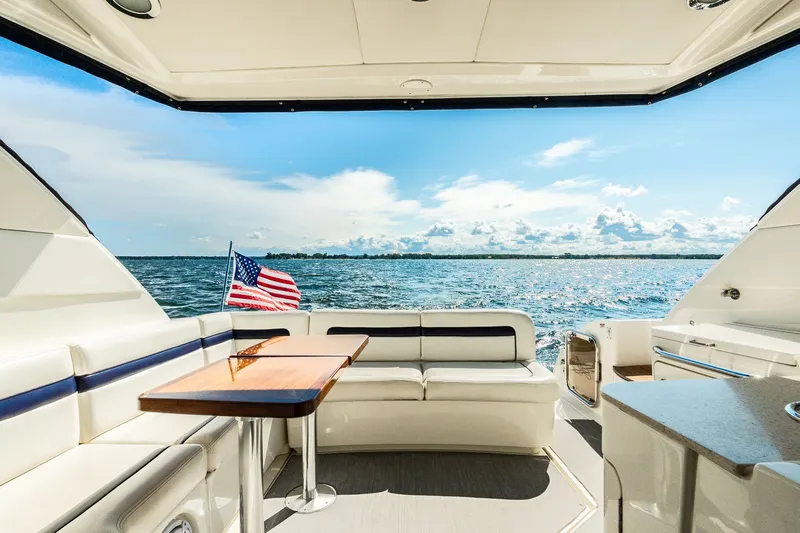 Hav-n Fun Yacht Photos Pics Luxurious 2009 Sea Ray 470 Sundancer yacht interior with ocean view and American flag.