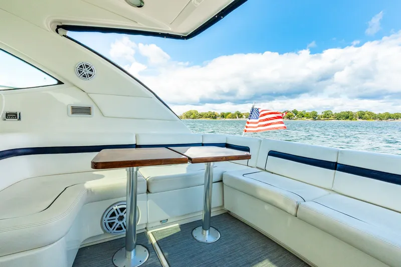 Hav-n Fun Yacht Photos Pics Luxurious 2009 Sea Ray 470 Sundancer yacht interior with seating and American flag.