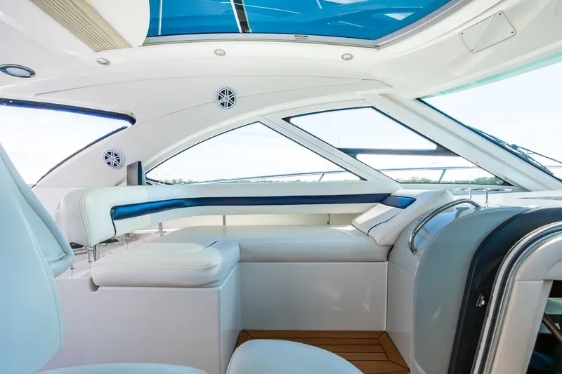 Hav-n Fun Yacht Photos Pics Interior of 2009 Sea Ray 470 Sundancer yacht with sleek seating and panoramic windows.