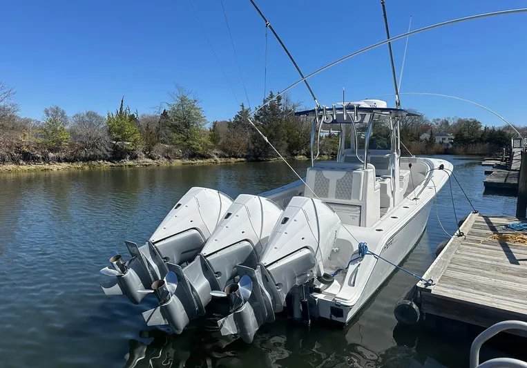 Avery Ann Yacht Photos Pics 2023 Front Runner 33 Center Console boat docked with triple outboard engines.