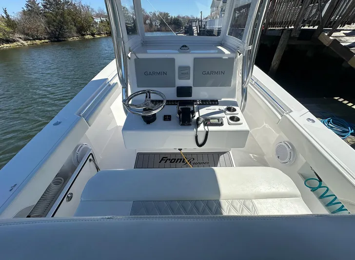 Avery Ann Yacht Photos Pics 2023 Front Runner 33 Center Console boat interior with Garmin navigation system.