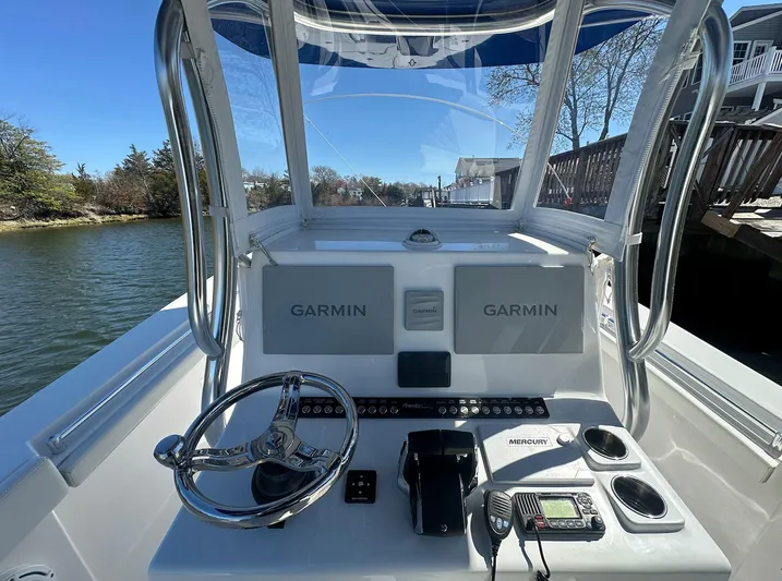 Avery Ann Yacht Photos Pics 2023 Front Runner 33 Center Console boat dashboard with Garmin navigation system.