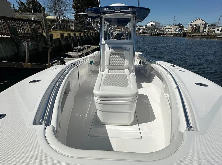 Avery Ann Yacht Photos Pics 2023 Front Runner 33 Center Console boat docked by waterfront homes.
