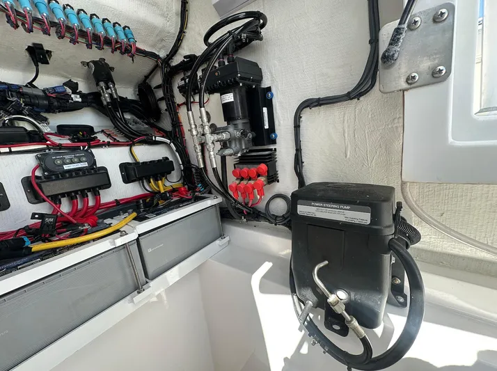 Avery Ann Yacht Photos Pics Electrical system inside 2023 Front Runner 33 Center Console boat, showcasing wiring and components.