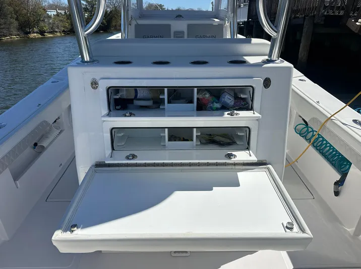 Avery Ann Yacht Photos Pics 2023 Front Runner 33 Center Console boat with open storage compartments.