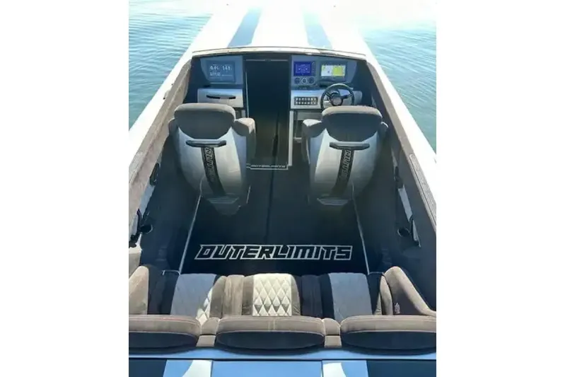  Yacht Photos Pics 2020 Outerlimits SL-50 boat interior with modern dashboard and seating.