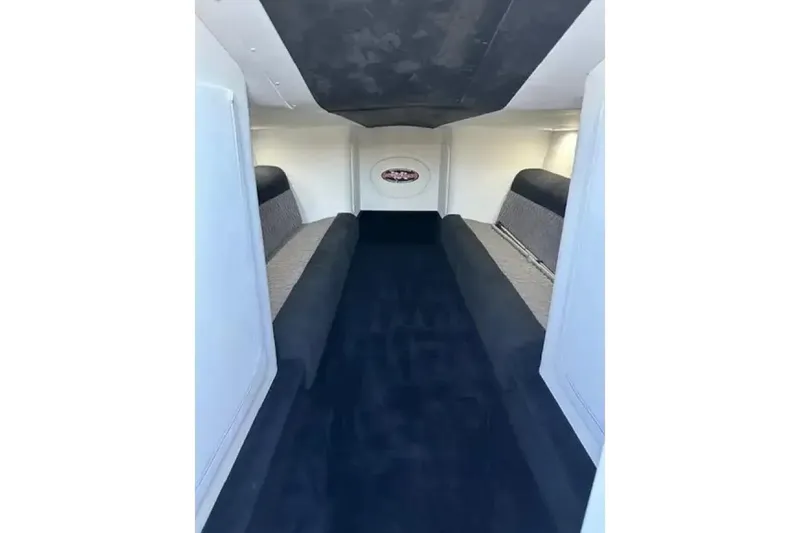  Yacht Photos Pics Interior of 2020 Outerlimits SL-50 boat, featuring sleek seating and modern design.