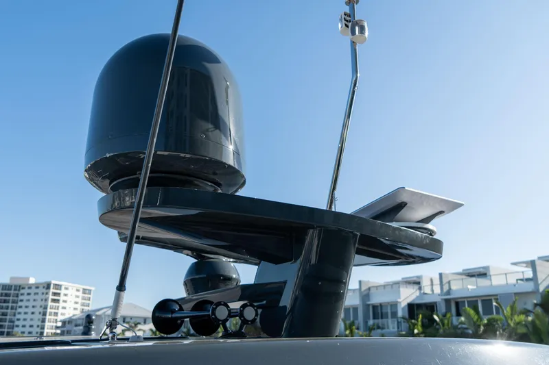 Freedom Yacht Photos Pics Sirena 58 Flybridge 2022 yacht radar and antenna system against clear blue sky.