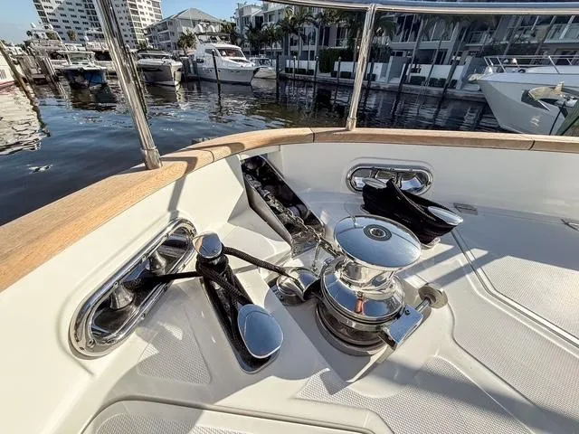 Freedom Yacht Photos Pics 2022 Sirena 58 Flybridge yacht deck with winch and mooring equipment.