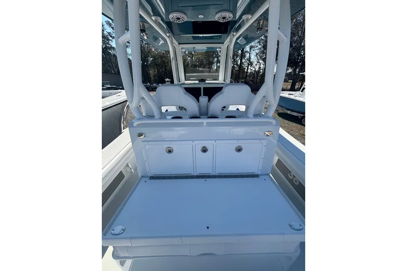  Yacht Photos Pics 2026 Yellowfin 36 Offshore boat interior with seating and storage compartments.
