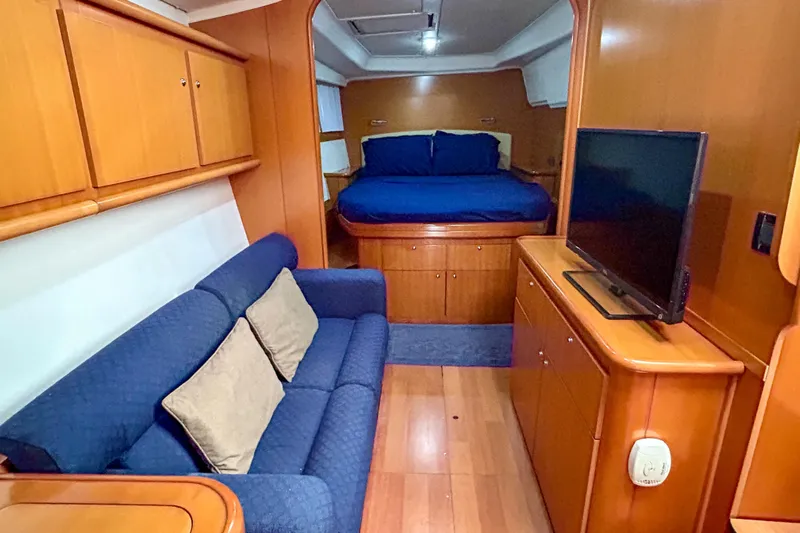 Sailifi Yacht Photos Pics Luxurious interior of 2007 Lagoon 440 yacht with cozy seating and modern amenities.