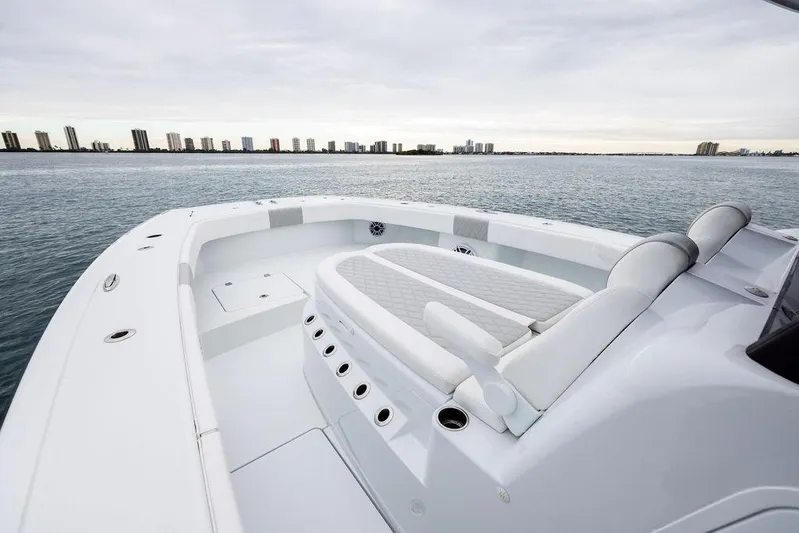 Never Enough Yacht Photos Pics Luxurious 2025 Freeman 38 boat interior with ocean view and city skyline.