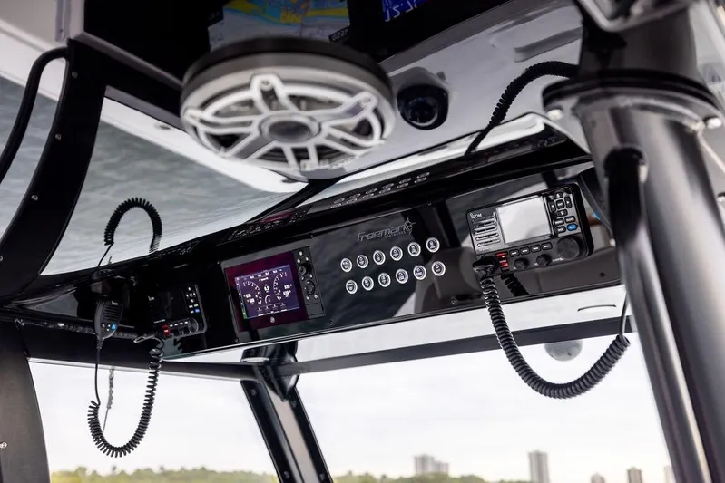 Never Enough Yacht Photos Pics 2025 Freeman 38 boat dashboard with advanced controls and communication systems.