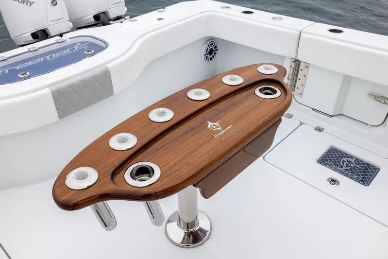 Never Enough Yacht Photos Pics Luxury Freeman 38 boat interior with wooden rod holder, 2025 model.