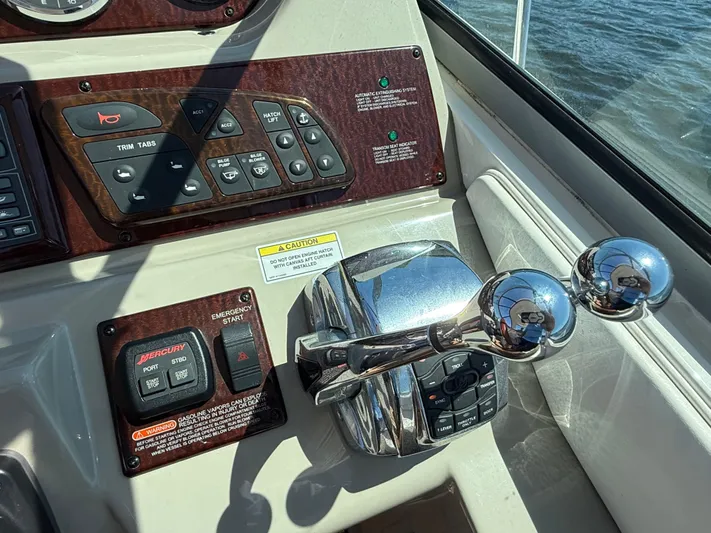  Yacht Photos Pics Control panel of 2012 Sea Ray 370 Sundancer boat with throttle and switches.