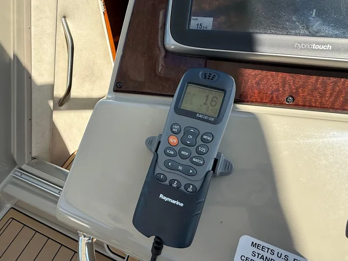  Yacht Photos Pics Raymarine VHF radio on 2012 Sea Ray 370 Sundancer yacht dashboard.