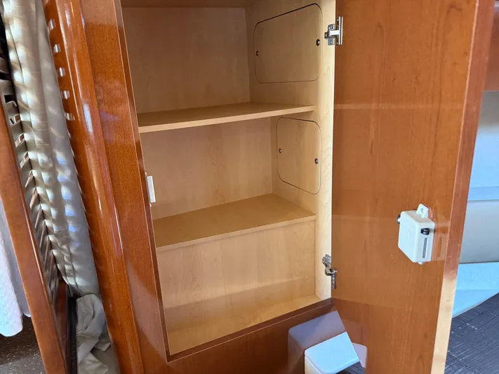  Yacht Photos Pics Empty wooden cabinet inside 2012 Sea Ray 370 Sundancer yacht.