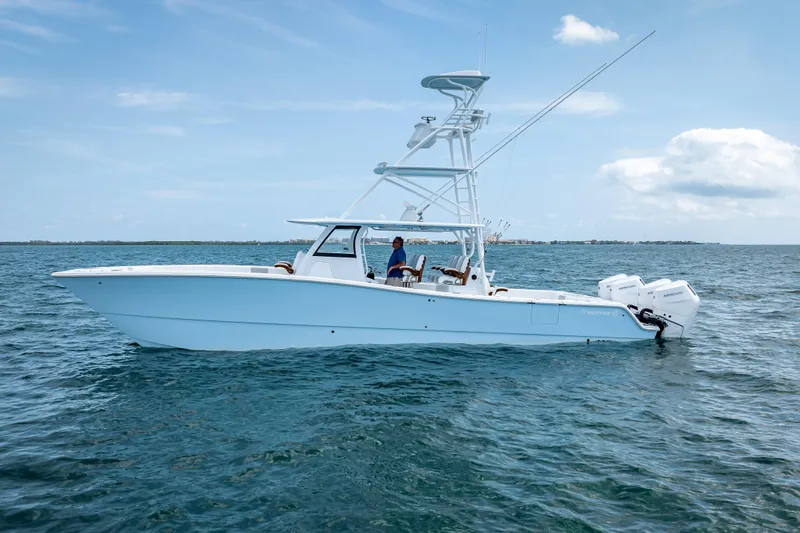 Cya Yacht Photos Pics 2025 Freeman 43 boat on open water, clear sky, side view.