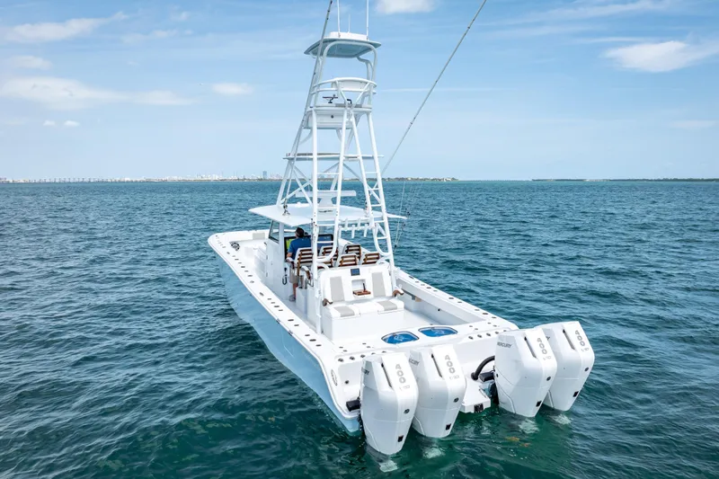 Cya Yacht Photos Pics 2025 Freeman 43 boat with multiple outboard engines on open water.