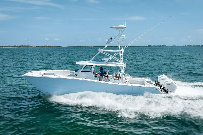 Cya Yacht Photos Pics 2025 Freeman 43 boat cruising on open water under clear blue skies.