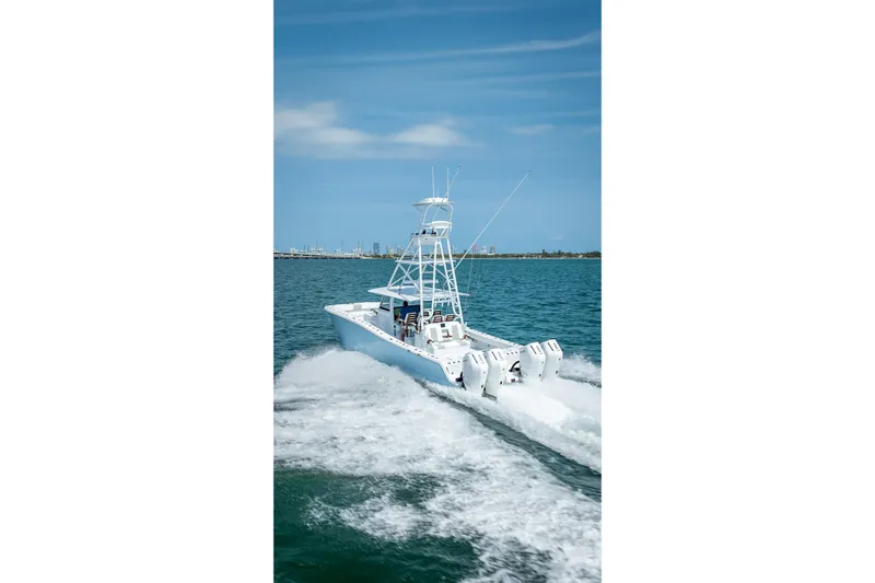 Cya Yacht Photos Pics 2025 Freeman 43 boat cruising on open water under clear blue sky.