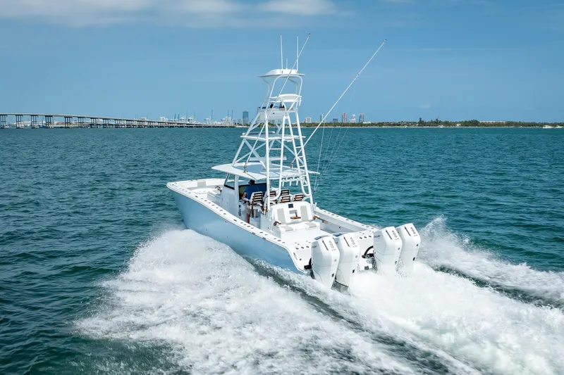 Cya Yacht Photos Pics 2025 Freeman 43 boat cruising on open water with four powerful engines.