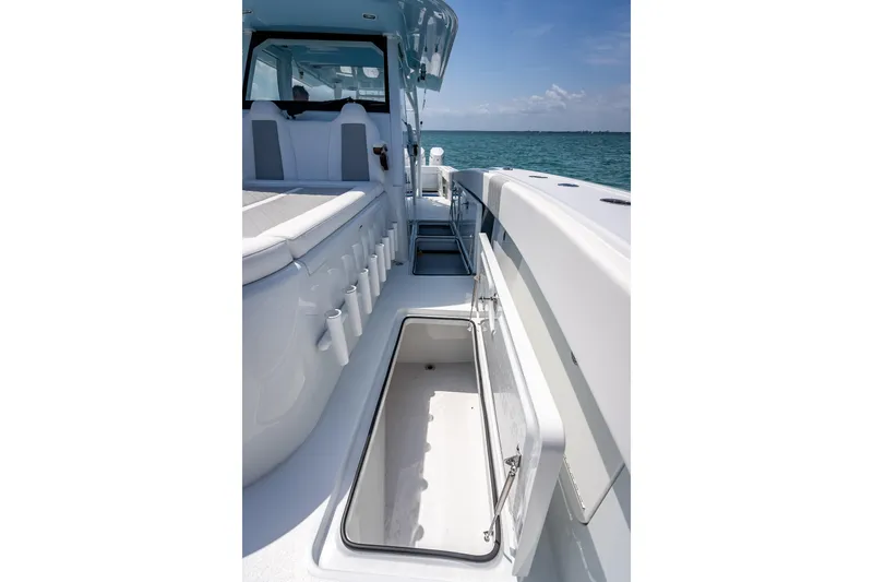 Cya Yacht Photos Pics 2025 Freeman 43 boat interior with open storage compartment, sleek design, and ocean view.