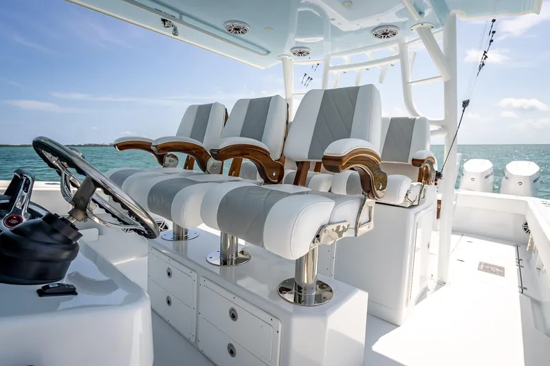 Cya Yacht Photos Pics Luxury seating on 2025 Freeman 43 boat, featuring elegant design and ocean backdrop.