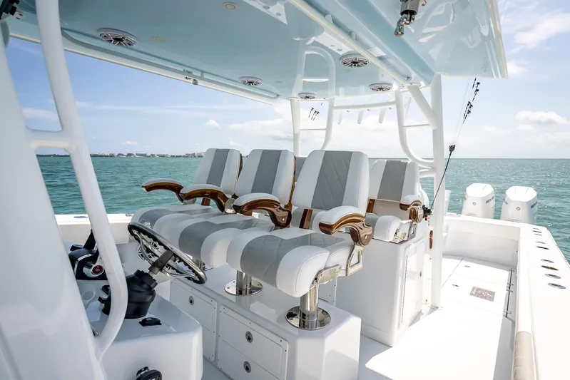 Cya Yacht Photos Pics Luxury seating on a 2025 Freeman 43 boat, overlooking the ocean.
