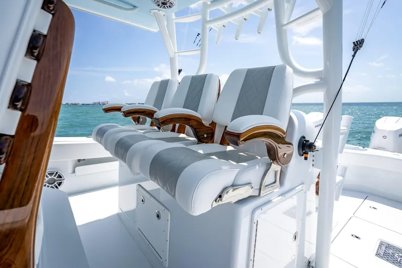 Cya Yacht Photos Pics Luxury seating on 2025 Freeman 43 boat, featuring elegant design and ocean backdrop.