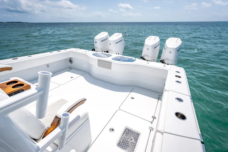 Cya Yacht Photos Pics 2025 Freeman 43 boat with four Mercury engines on open sea.