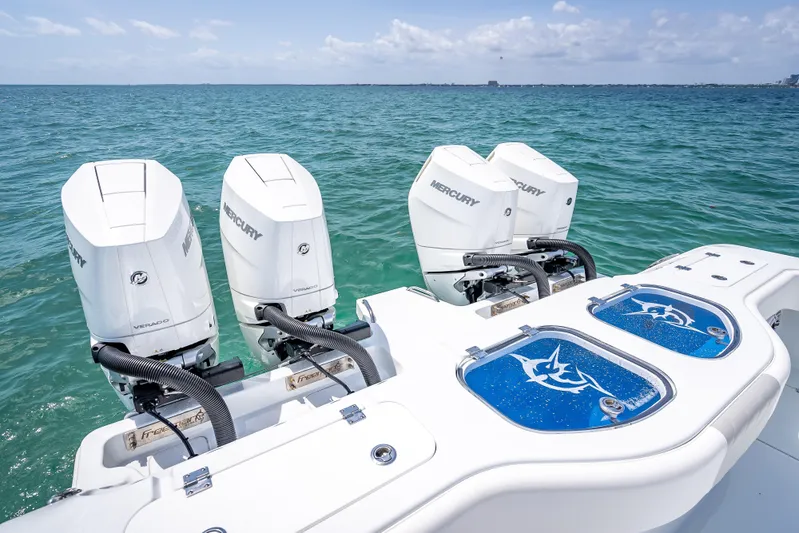 Cya Yacht Photos Pics Freeman 43 boat with four Mercury Verado engines on open sea, 2025 model.