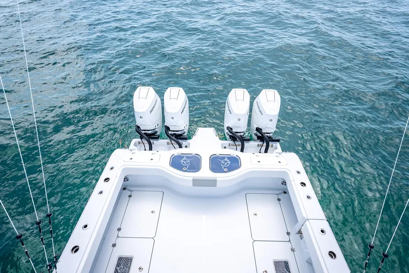 Cya Yacht Photos Pics 2025 Freeman 43 boat with quad outboard motors on open water.