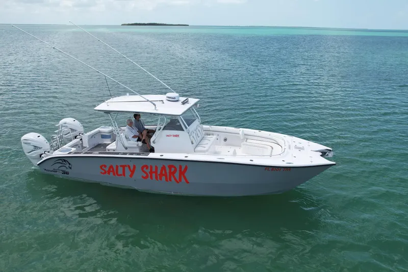  Yacht Photos Pics 2023 Prowler Renaissance Prowler 36 boat named "Salty Shark" on calm ocean waters.