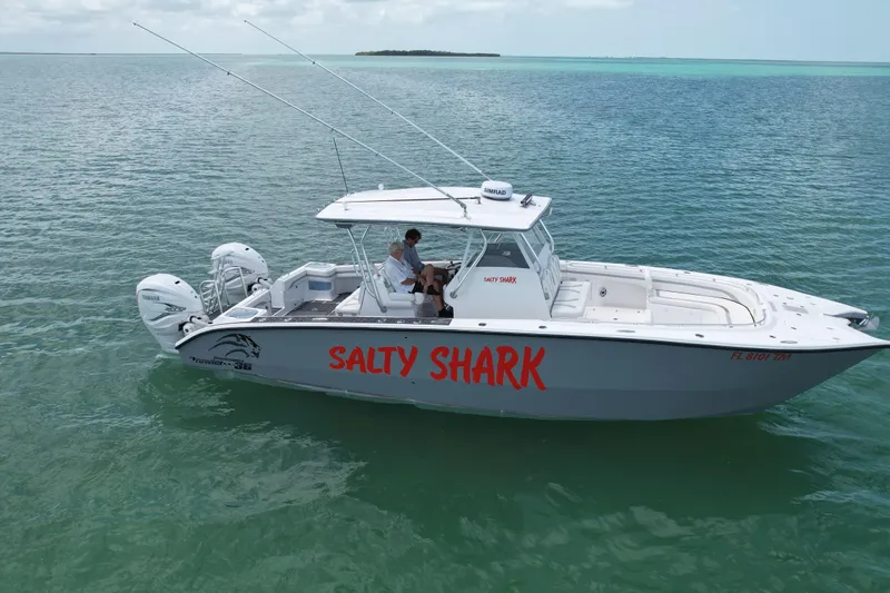  Yacht Photos Pics 2023 Prowler Renaissance Prowler 36 boat "Salty Shark" on clear blue water.