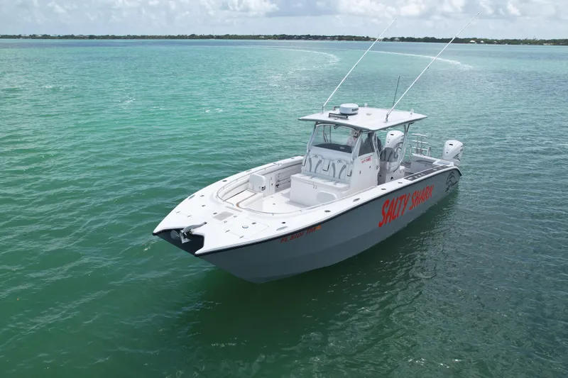  Yacht Photos Pics 2023 Prowler Renaissance Prowler 36 boat on turquoise water, labeled "Salty Shark."