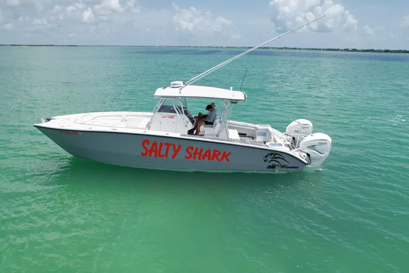  Yacht Photos Pics 2023 Prowler Renaissance Prowler 36 boat named "Salty Shark" on turquoise water.