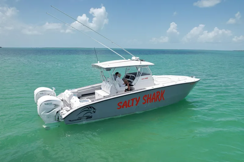  Yacht Photos Pics 2023 Prowler Renaissance Prowler 36 boat named "Salty Shark" on turquoise water.