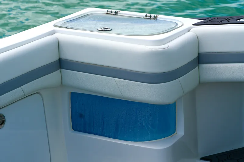  Yacht Photos Pics 2023 Prowler Renaissance Prowler 36 boat interior detail with cushioned seating and storage.