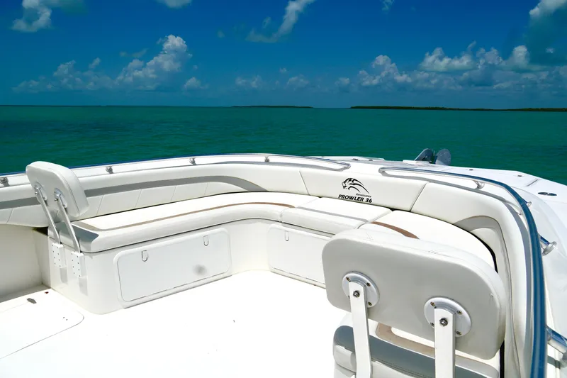  Yacht Photos Pics 2023 Prowler Renaissance Prowler 36 boat with white seating, ocean view, and blue sky.