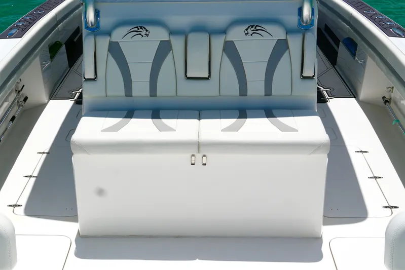  Yacht Photos Pics 2023 Prowler Renaissance Prowler 36 boat seating, featuring sleek white and gray design.