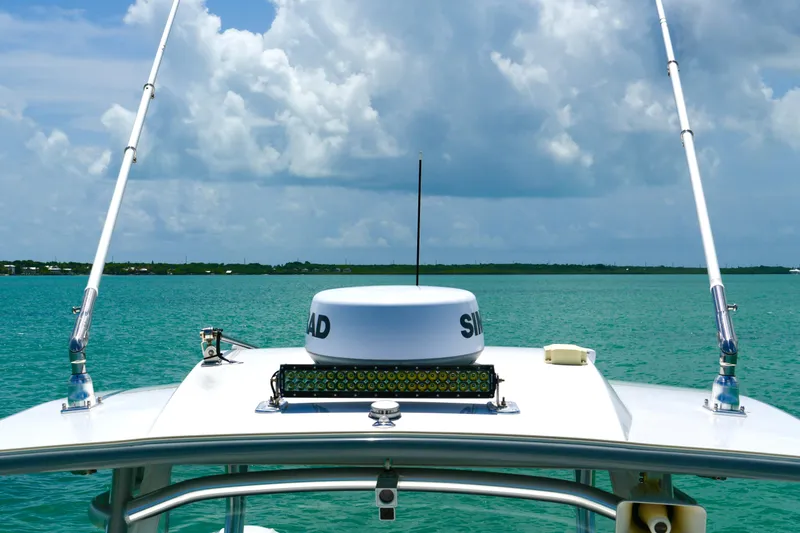  Yacht Photos Pics 2023 Prowler Renaissance Prowler 36 boat on turquoise water under cloudy sky.