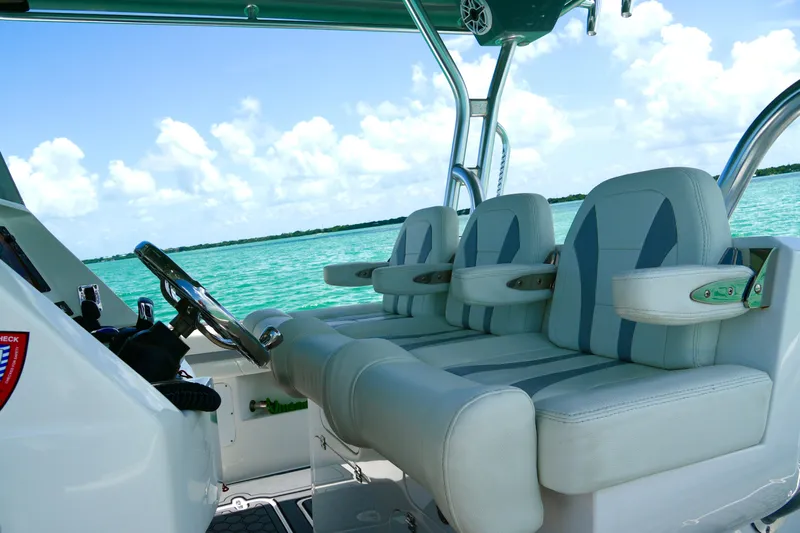  Yacht Photos Pics 2023 Prowler Renaissance Prowler 36 boat interior with luxurious seating and ocean view.