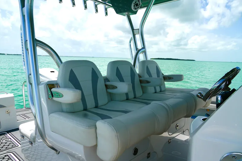  Yacht Photos Pics Luxurious seating on 2023 Prowler Renaissance Prowler 36 boat, overlooking turquoise waters.