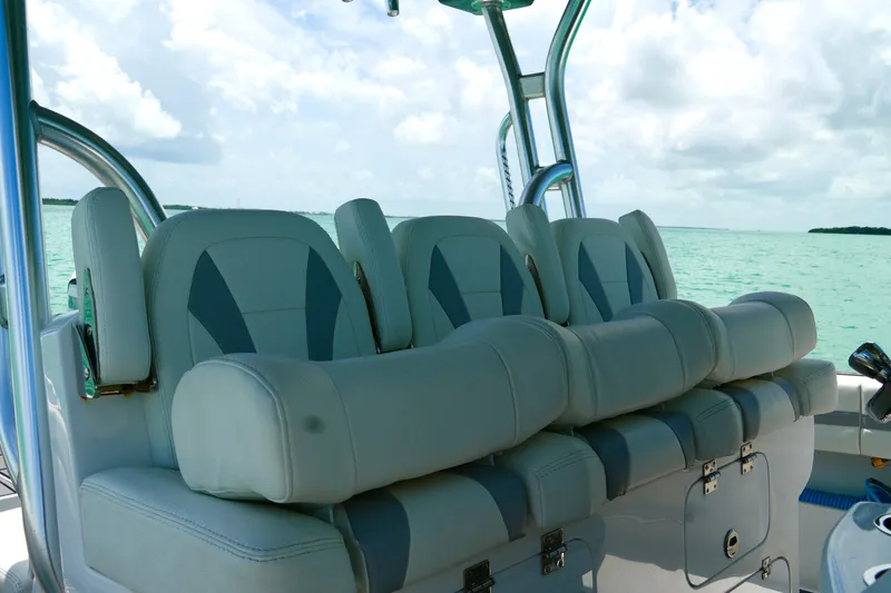  Yacht Photos Pics Luxurious seating on 2023 Prowler Renaissance Prowler 36 boat, overlooking serene turquoise waters.