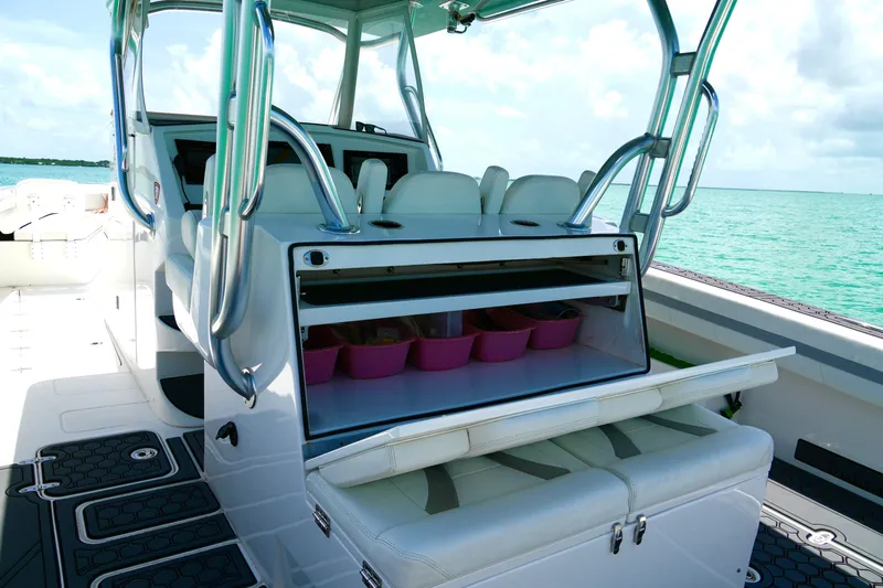  Yacht Photos Pics 2023 Prowler Renaissance Prowler 36 boat interior with seating and storage, ocean view.