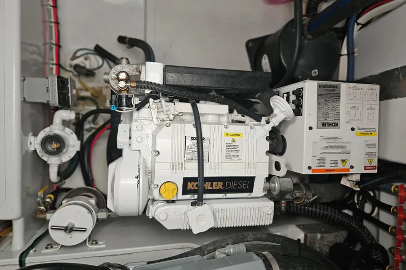  Yacht Photos Pics Engine room of 1996 Blackfin 33 Combi with Kohler diesel generator.