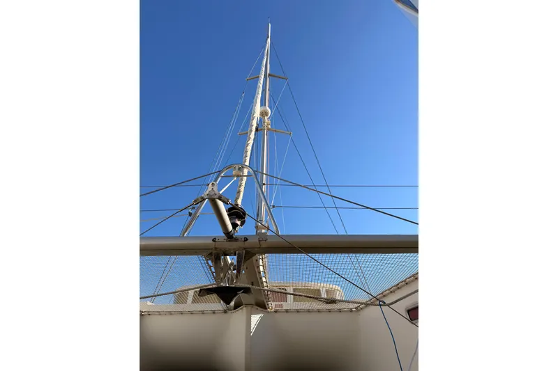  Yacht Photos Pics Mast of 2010 Lagoon 440 catamaran against clear blue sky.