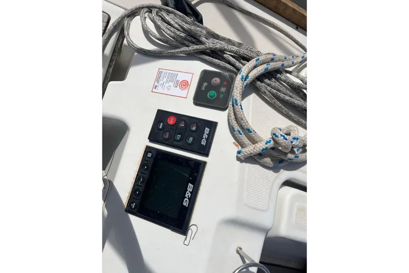  Yacht Photos Pics Control panel and ropes on a 2019 Beneteau Oceanis 45 sailboat deck.